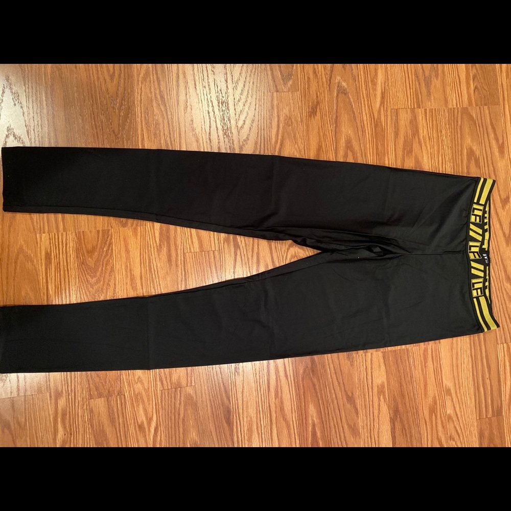 LF leggings with black and gold waistband